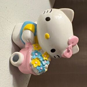 Hello Kitty Pink Bow Figurine with Blue and Yellow Flowers